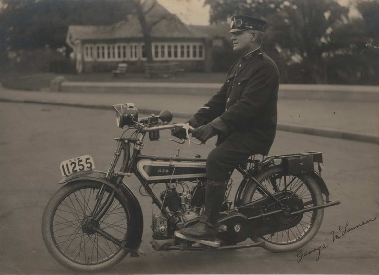 Item #CL169-97 George McLennan, First NSW Police Motor Cyclist, [On AJS Motorcycle. Outside Art Gallery Of New South Wales, Sydney]