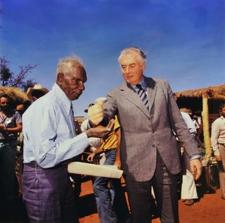 Item #CL179-92 Prime Minister Gough Whitlam Pours Soil Into Hand Of Traditional Land Owner...