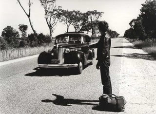 Item #CL186-25 [Richard Moir Hitchhiking While Judy Morris Drives On The Set Of “In Search...