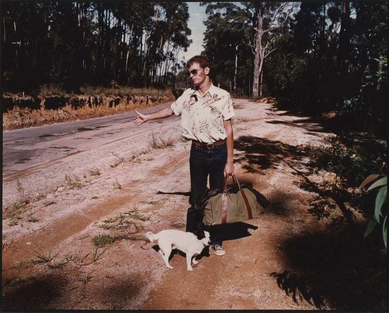 Item #CL186-29 [Richard Moir Hitchhiking With Dog Billy On The Set Of “In Search Of Anna”]. Carol Jerrems, Aust.
