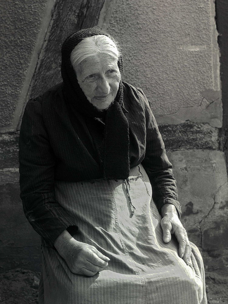 Item #CL188-12 Woman In Fishing Village, Steinhude. Heide Smith, b.1937 German/Australian.