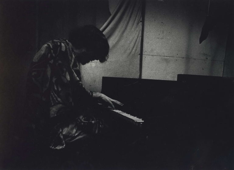 Item #CL191-158 [Bass Player “Jimmy” Stevenson At Piano, “Jazz Loft”, New York]. W. Eugene Smith, Amer.