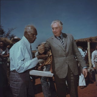 Item #CL191-51 Prime Minister Gough Whitlam Pours Soil Into Hand Of Traditional Land Owner...