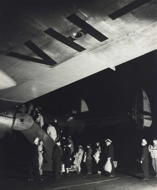 Item #CL195-73 [Passengers Boarding A Qantas Constellation Plane At Night]. Max Dupain,...