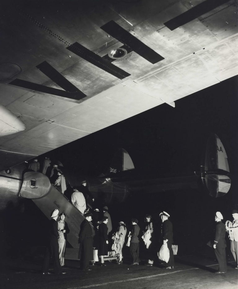 Item #CL195-73 [Passengers Boarding A Qantas Constellation Plane At Night]. Max Dupain, 1911–1992 Aust.